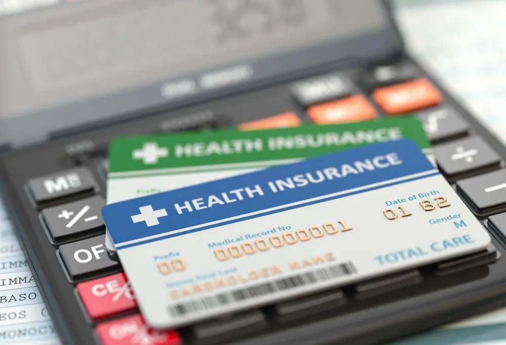 stack of health insurance cards 