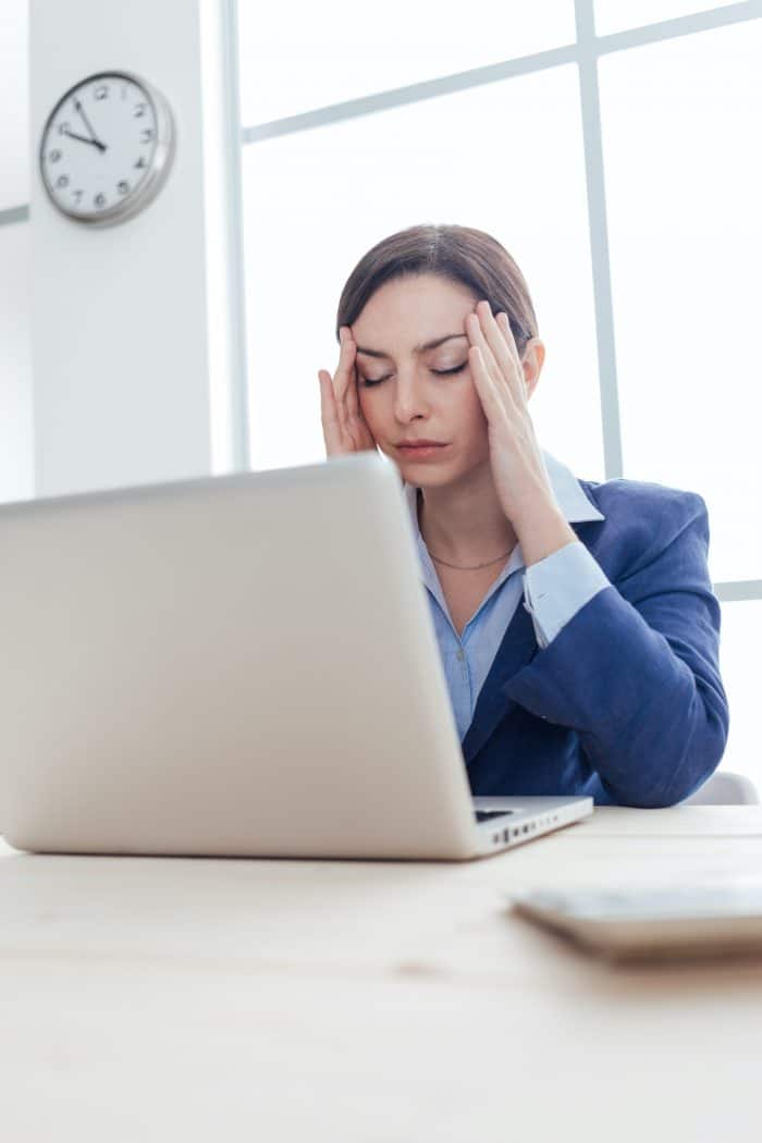 business woman having a headache