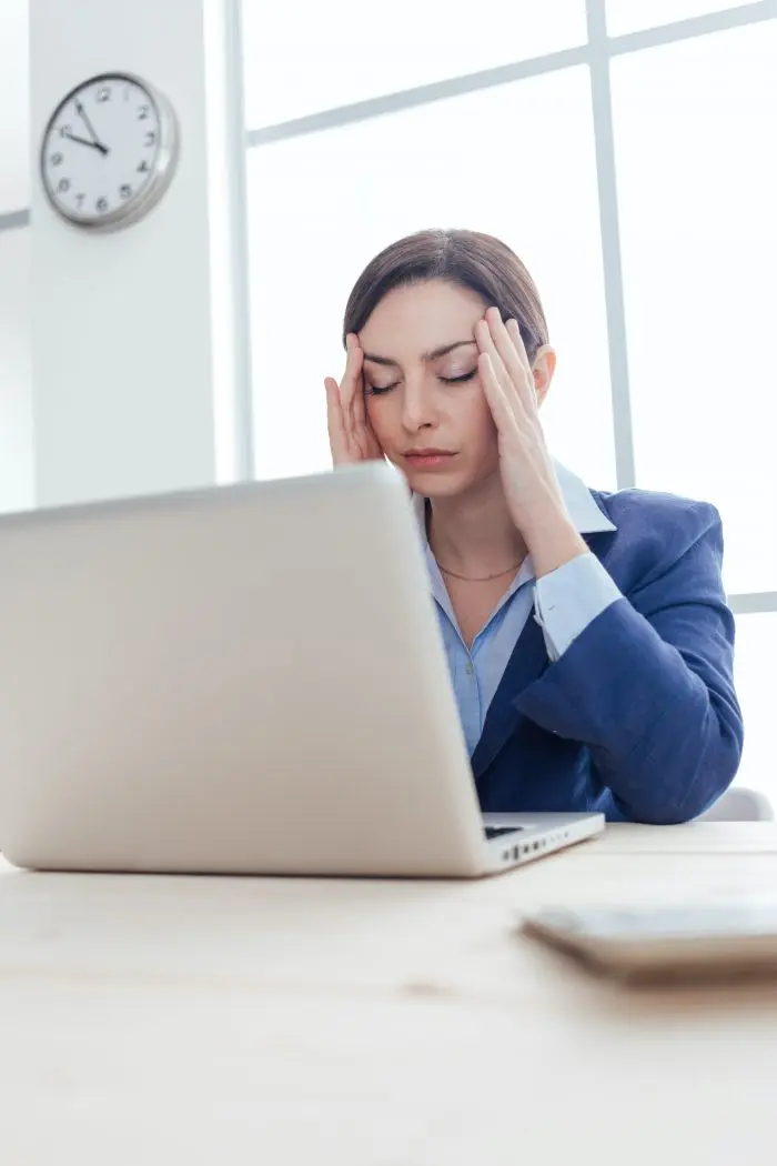 business woman having a headache