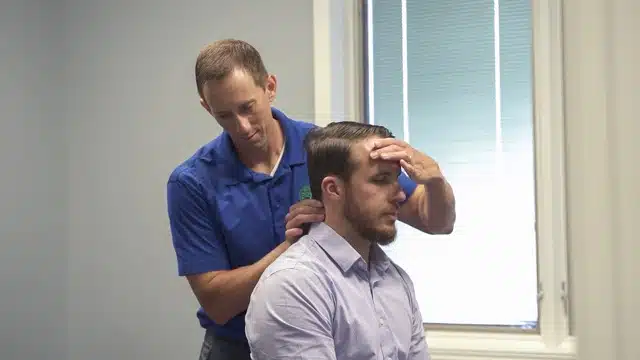 chiropractor is doing some chiropractic care treatment to the patient at North East chiro center.