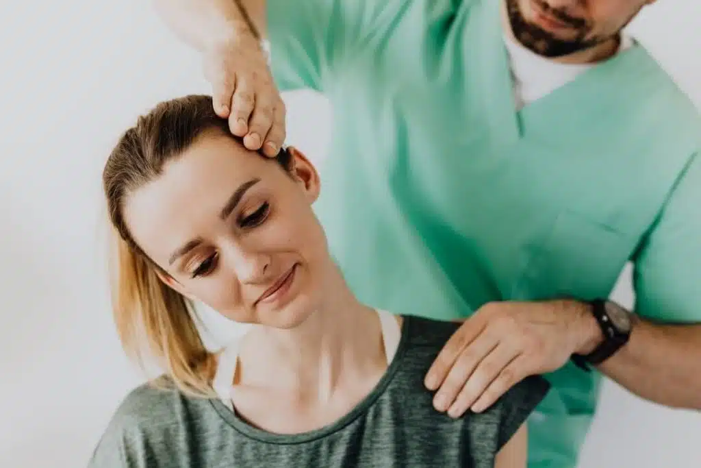 Chiropractor is doing some chiropractic treatment to the patient.