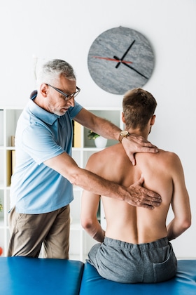 patient with back injury from car accident being treated by Chiropractic Care After An Auto Accident