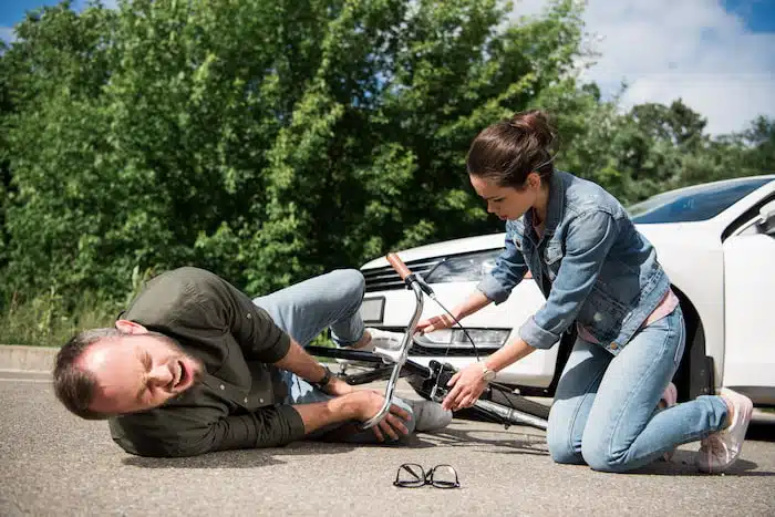 man on bike being hit by a car | Chiropractic Care After An Auto Accident