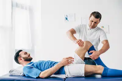 athlete getting chiropractic adjustment prior the game day | chiropractic routines for hoosier basketball teams